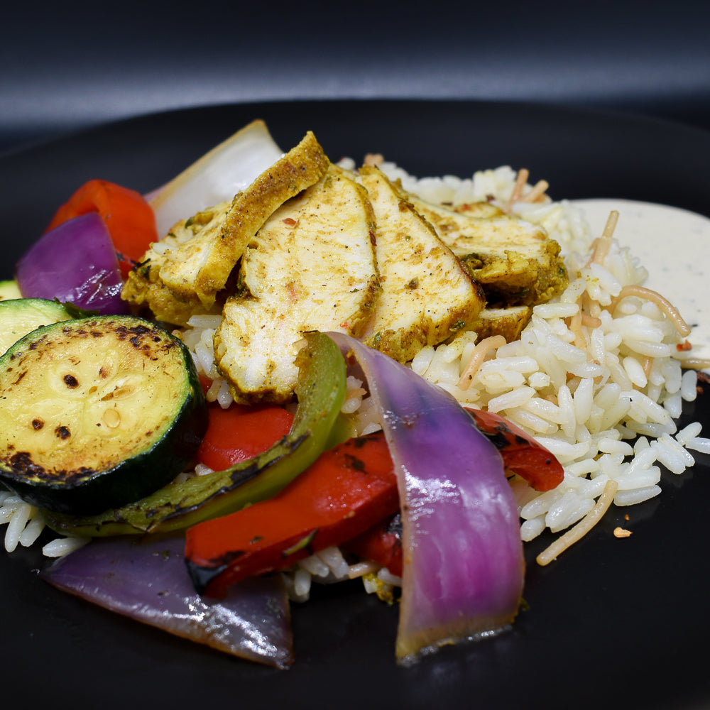 Vermicelli rice, grilled chicken with a mint-tahini sauce.