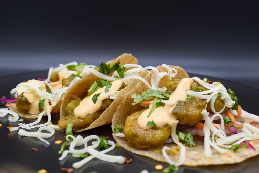 Cilantro Lime shrimp tacos with aioli sauce.